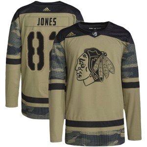 Caleb Jones Men's Adidas Chicago Blackhawks Authentic Camo Military Appreciation Practice Jersey